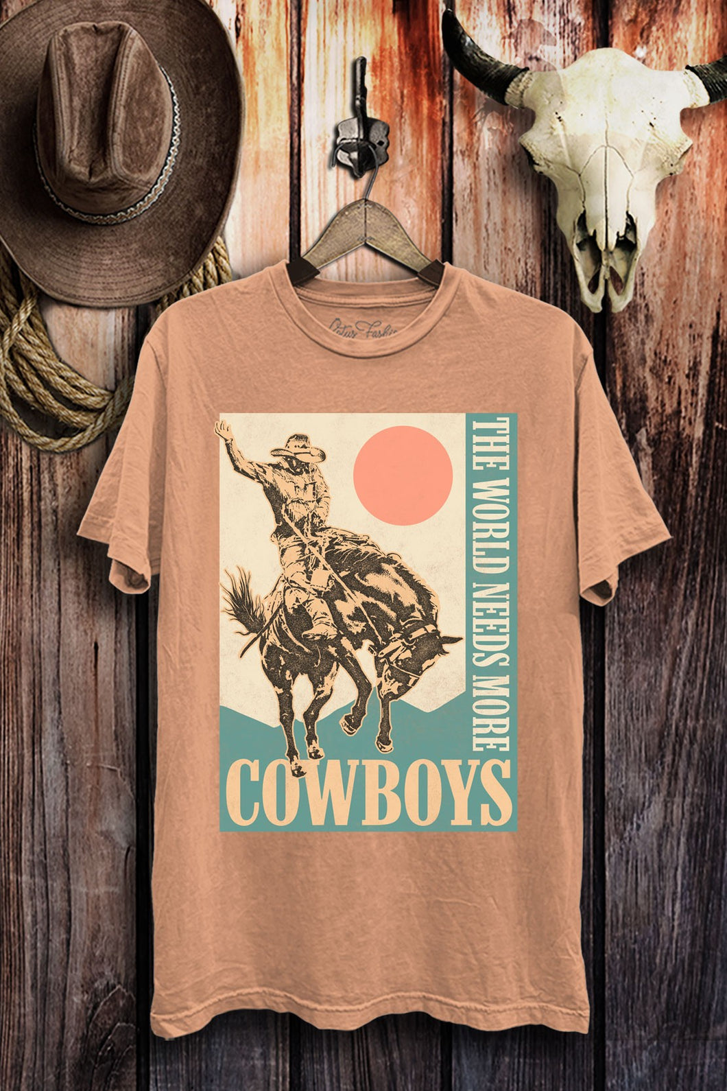 Coral The World Needs More Cowboys Graphic Tee