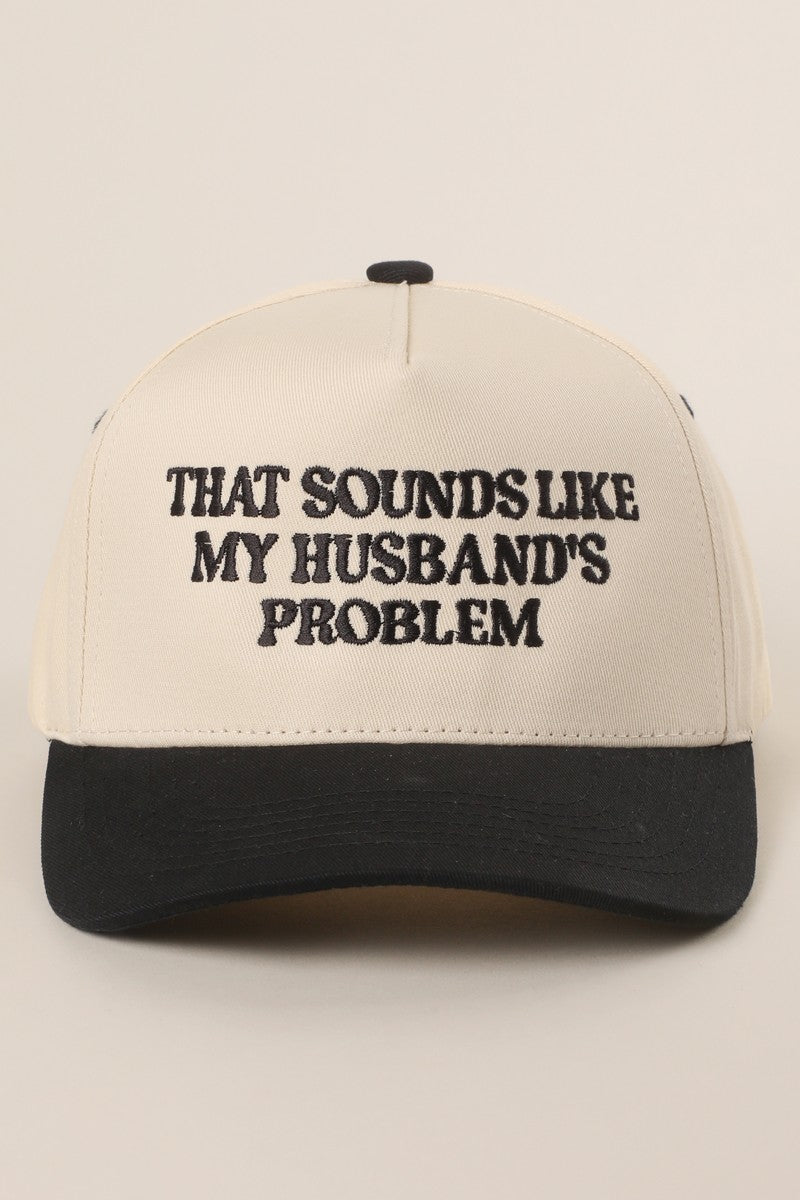 Black "That Sounds Like My Husband's Problem" Embroidered Hat