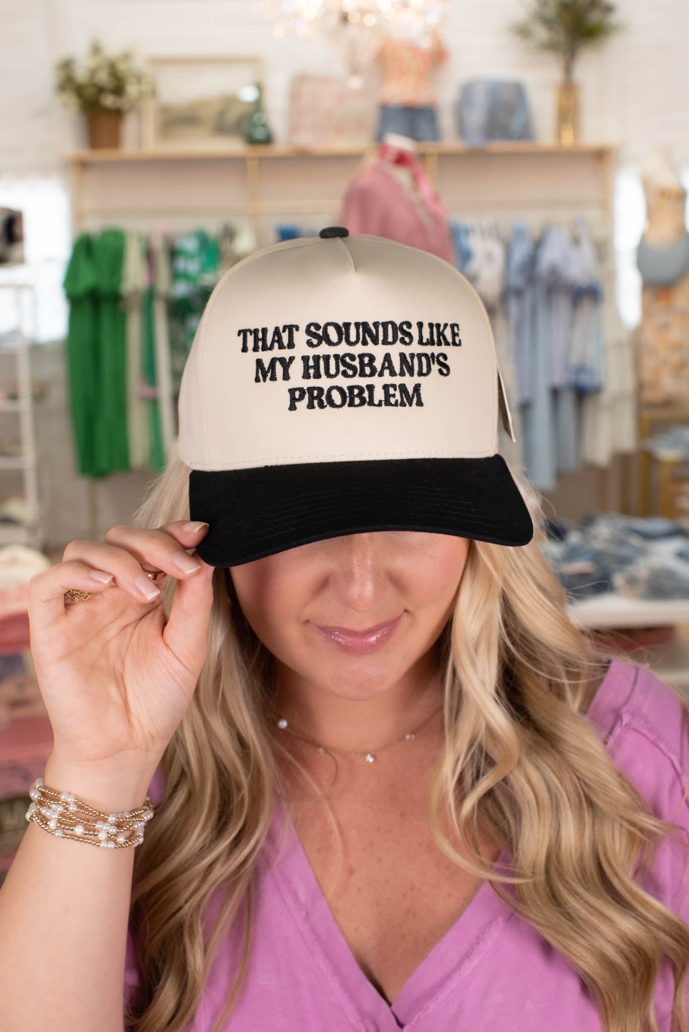 Black "That Sounds Like My Husband's Problem" Embroidered Hat