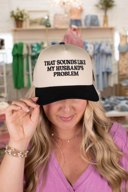 Black "That Sounds Like My Husband's Problem" Embroidered Hat