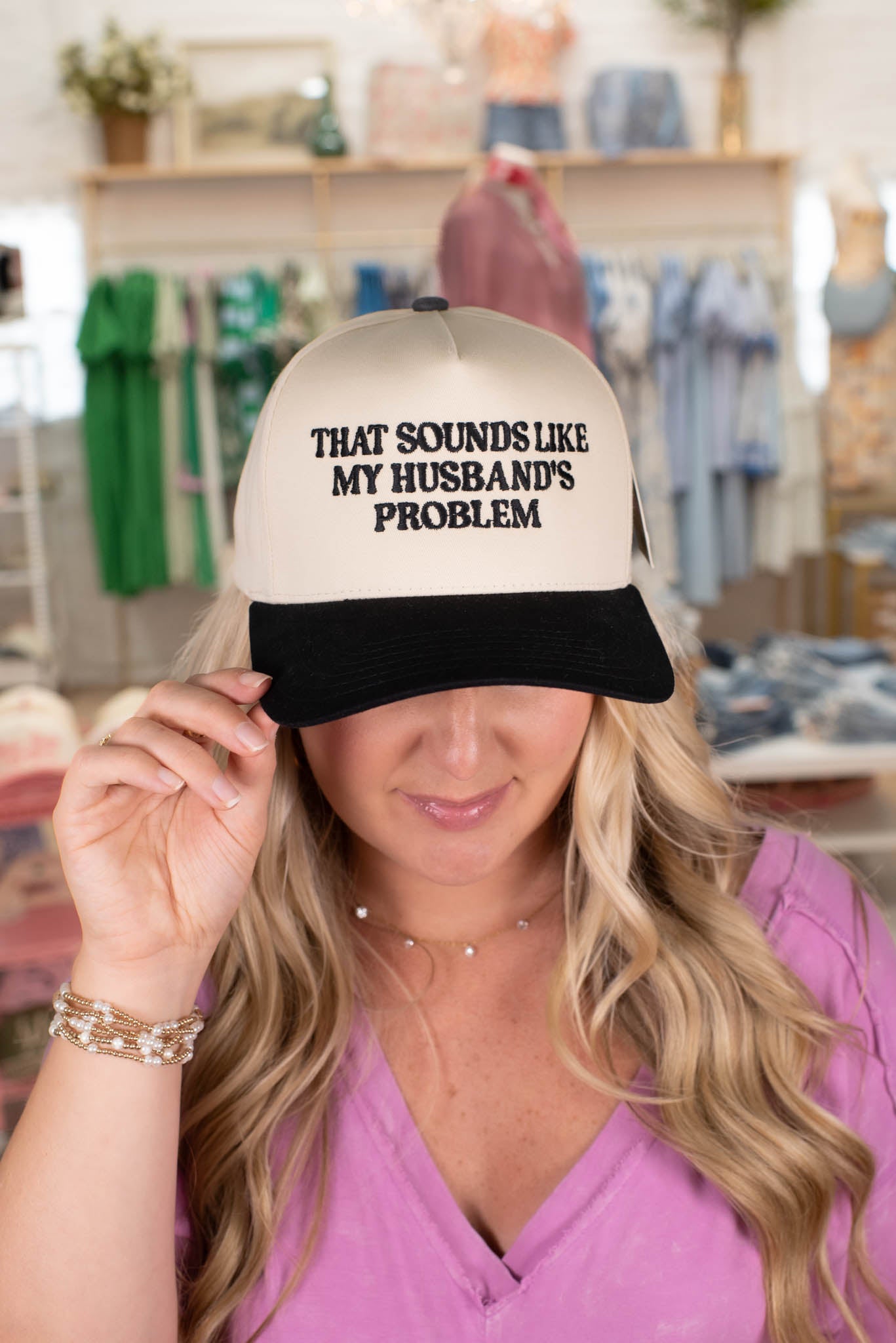 Black "That Sounds Like My Husband's Problem" Embroidered Hat